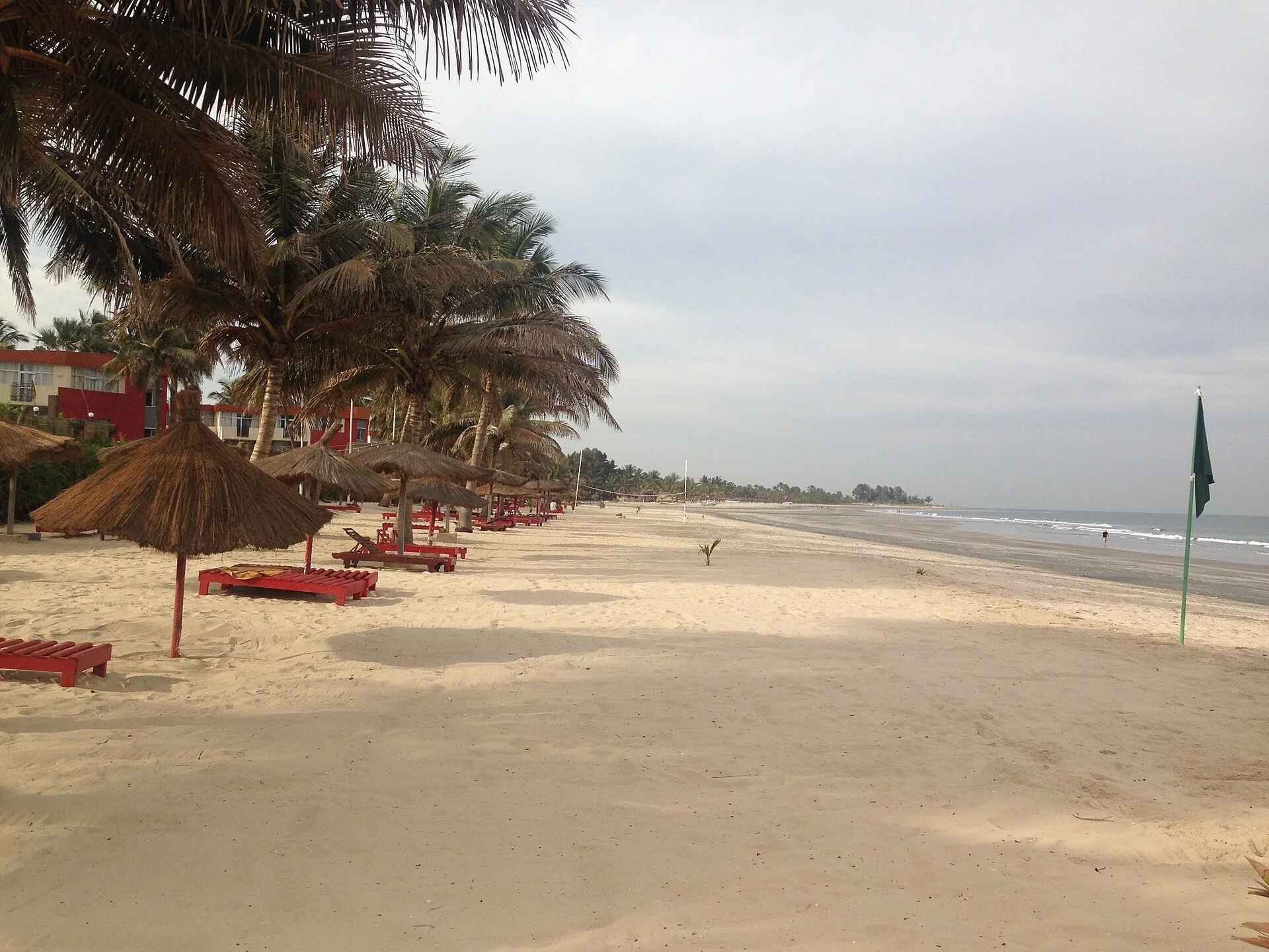 Palm-lined Kotu Beach on The Gambia’s coast in daylight